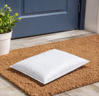 Plain white bubble mailer delivered to doorstep. 